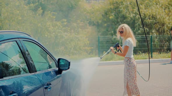 Car Cleaning And Waxing Vehicle.Dirty Car Cleaning And Protection With Active Foam. alt