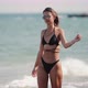 Woman in Bikini Walking on the Beach Slow Motion - VideoHive Item for Sale