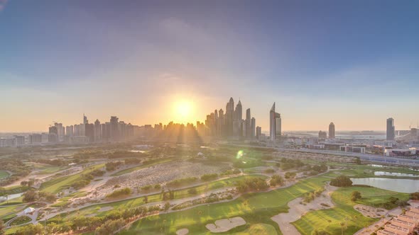 Dubai Marina Skyscrapers and Golf Course Sunset Timelapse Dubai United Arab Emirates alt