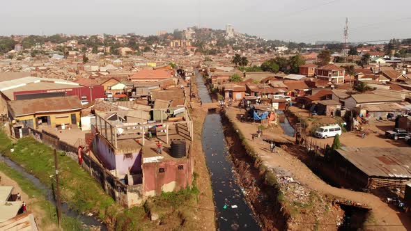 Drone Shot Over the Slums of Uganda Going Backwards