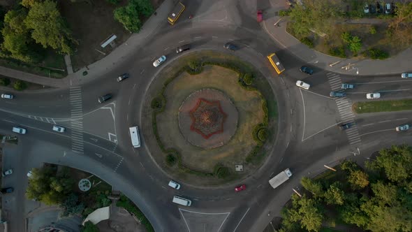 Aerial View of Road with Circular Cars alt