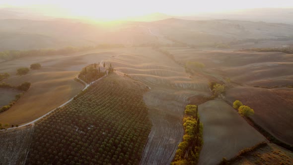 Val d'Orcia Valley with Farmhouse, Cypress Trees and Rolling Hills, Tuscany Aerial View alt
