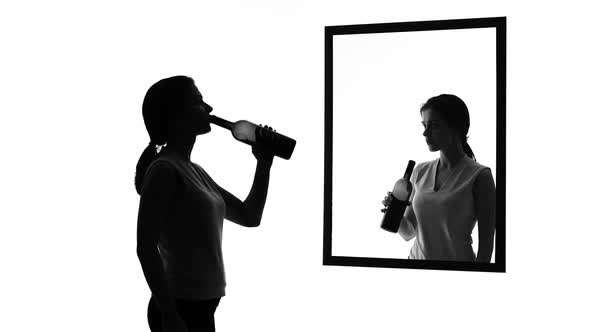 Drunk Woman With Alcohol Bottle Looking in Mirror, Conscience Asking to Stop alt