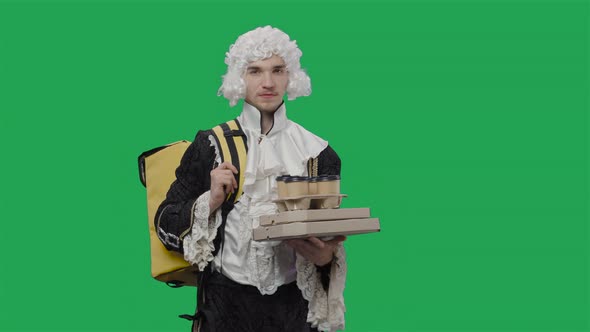 Portrait of Courtier Gentleman in Black Historical Vintage Suit and White Wig Delivering Food and alt