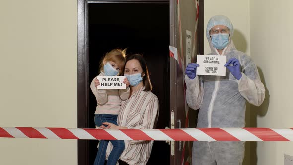 Sick Family of Mother and Daughter Opening Door for Doctor Coronavirus Quarantine Lockdown Concept alt
