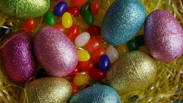 Rotating shot of Easter decorations and candy in colorful Easter grass - EASTER 016 alt