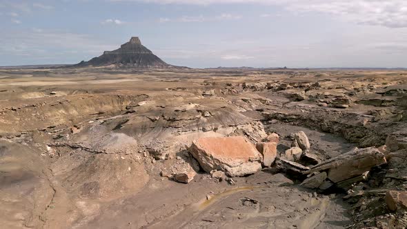 Flying over the desert landscape after flood washed through the desert in Utah alt