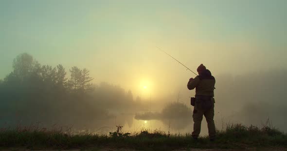 Human Casts a Fishing Rod at Dawn