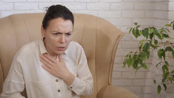 Lady with Chest Pain and Breathing Indoor alt