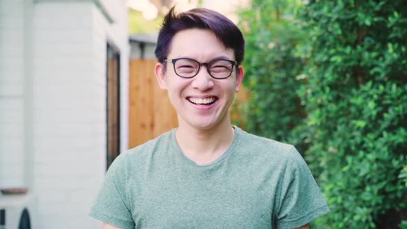 Young friendly male relax toothy smile looking to camera.