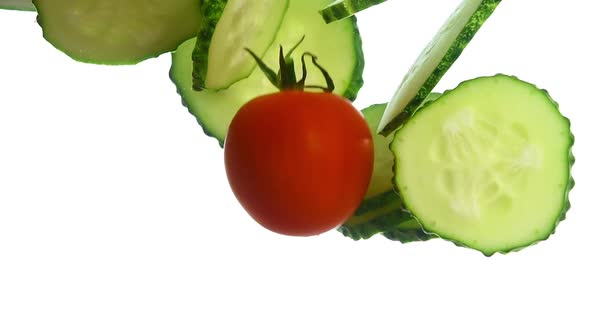 Cut Sliced Cucumbers and Cherry Tomatoes in Water alt