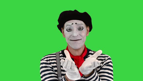 Mime Sending You His Heart on a Green Screen Chroma Key alt