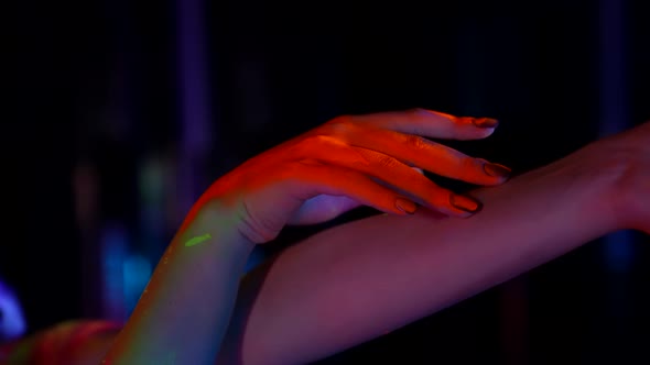 Image for Halloween Woman is Painted By Fluorescent Dyes Closeup of Face and Body alt