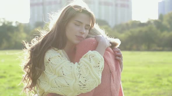 Couple in love hugging outdoors. 