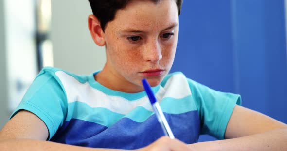 Student studying in classroom alt