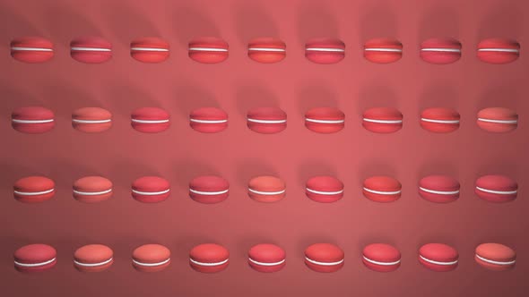 Red macaron pastries on light paper background