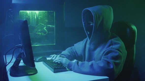 Cybercriminal Hacker Typing and Showing Like to Camera