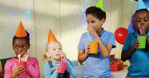Kids having drink during birthday party 4k alt