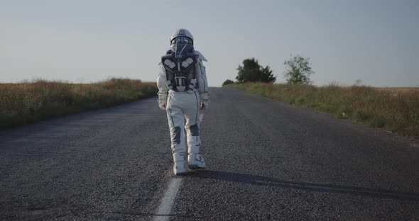Astronaut Walking on Road alt