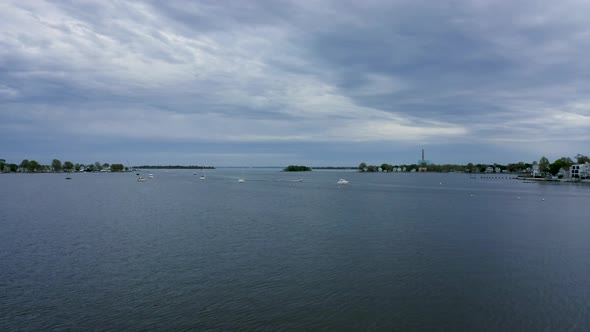 Aerial Shot of Quiet Harbor with Boats Coming in Before a Storm (Norwalk, Connecticut) alt