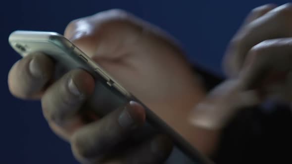 Male Hands Using Smartphone Application, Surfing Internet, Texting Message alt