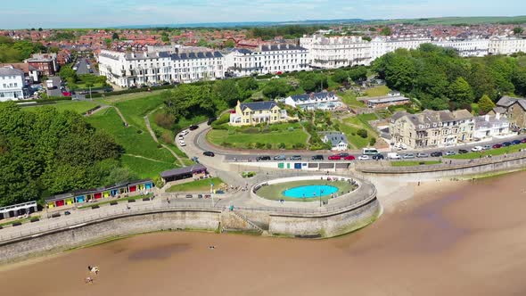 Static aerial footage of the beach front in the town of Filey in the UK alt