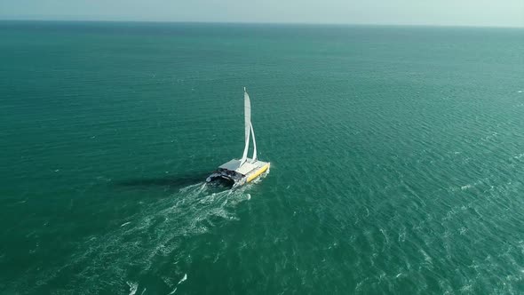 Follow behind a Catamaran  alt