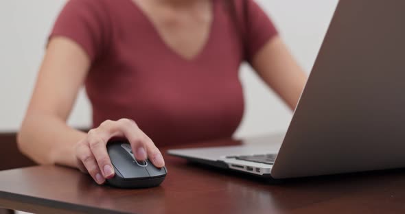 Woman work on computer at home alt