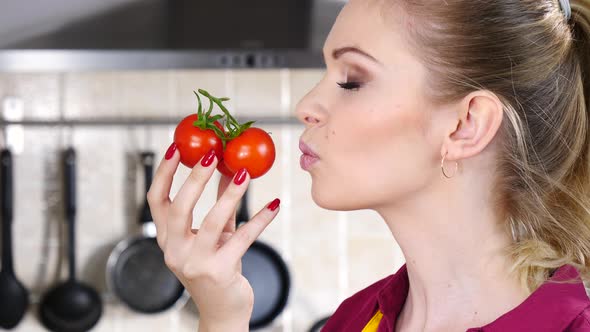 Woman Holds Tomatoes