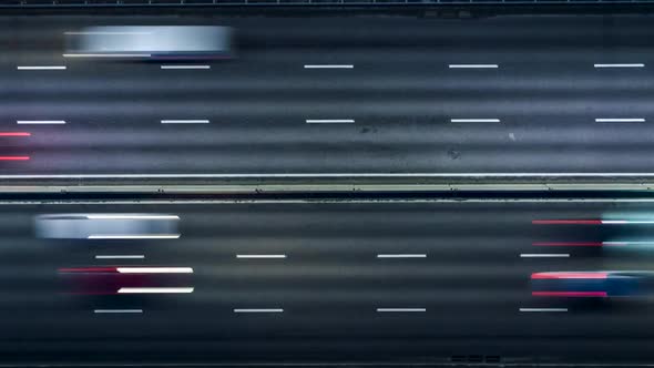 Freeway Traffic Jam City Rush Hour. Aerial Night View Time Lapse City Traffic alt