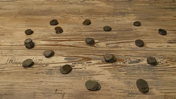 Stop Motion. Loop video. Blue piggy bank in the form of a mouse on wood floor