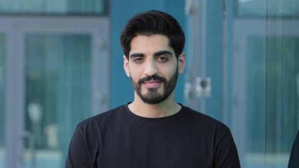 Closeup Head Shot Confident Serious Concentrated Young Man Businessman or Manager Looking at Camera alt