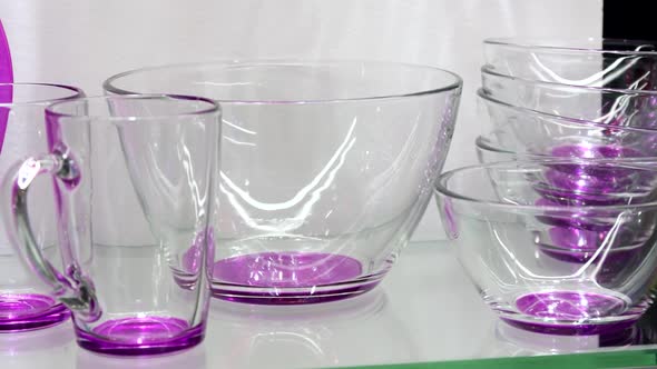 Differentcolored Glass Cups Plates and Saucers
