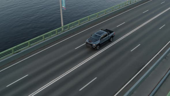 American Pickup Car Dodge Ram TRX Driving on the Asphalt Road alt