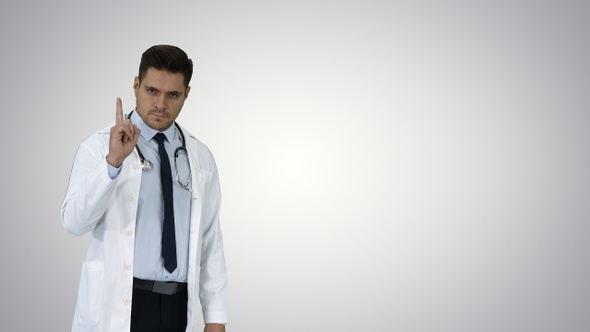Doctor man medical professional making a point gesture alt