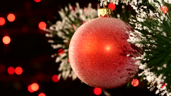 Unusual Decoration - a Round Red Toy on Christmas Tree, Bokeh, Light, Black, Garland alt