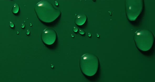 Abstract water drops on green background, macro, Bubbles close up