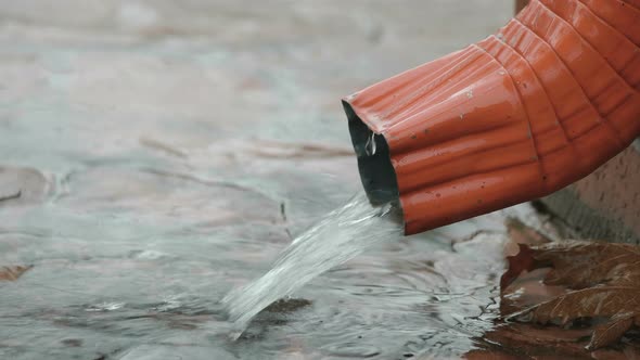 Rain Water Flows From the Gutter alt