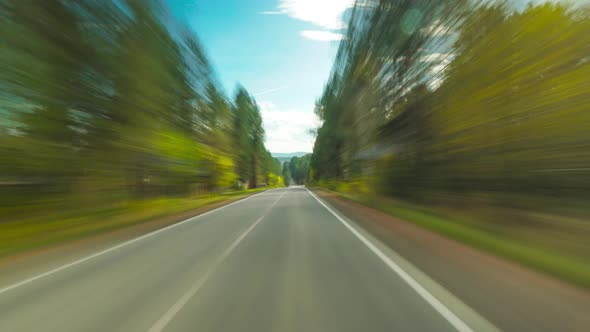 High Speed On The Open Road Fast Car Hyperlapse Road Trip Travel Concept Sort of Dashcam POV alt