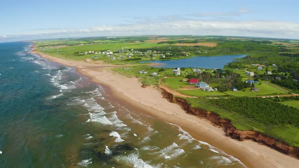 Thunder Cove Beach, summertime. Beautiful aerial view showing the distant Prince Edward Island lands alt