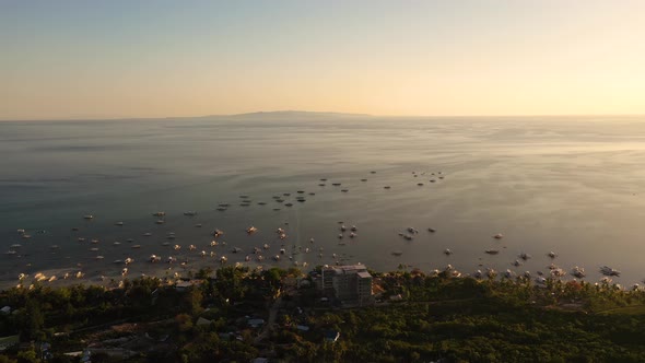 Boats on Alona Beach at Sunset. Panglao, Philippines alt