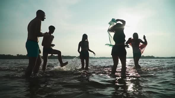 Company of Young People Is Resting on the River alt