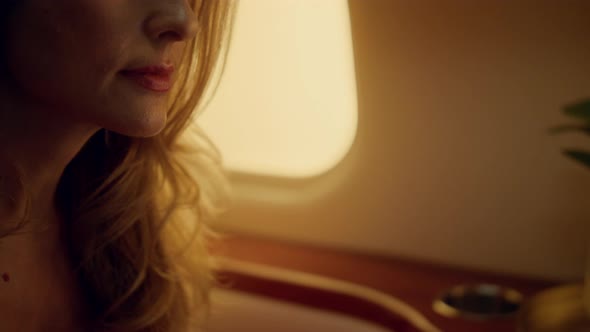 Financial Expert Looking Computer Screen on Plane alt