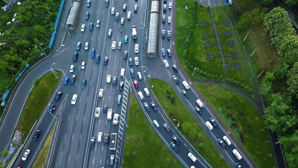 Aerial View of Loaded Cars with Traffic Jam at Rush Hour on Highway with Bridge