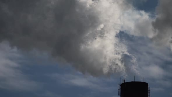 Smoke Comes From the Chimney. Air Pollution. Slow Motion. Ecology. Kyiv. Ukraine alt