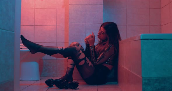 escape from reality - psychotic girl in torn pantyhose turns on a joint alt