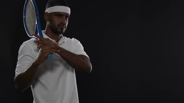 Self-Confident Tennis Player Holding Racket and Looking on Court, Sport, Hobby