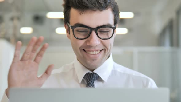 Online Video Chat By Businessman Frontal View alt