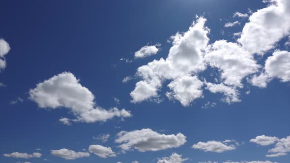Time Lapse of Sky and Clouds. Beautiful Cloudscape in the Sunny Day. Freedom Concept  alt