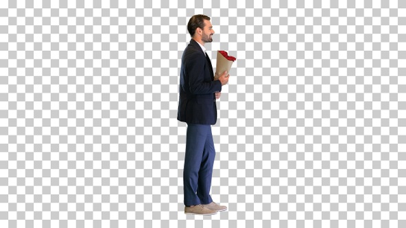 Smiling handsome businessman holding roses, Alpha Channel alt